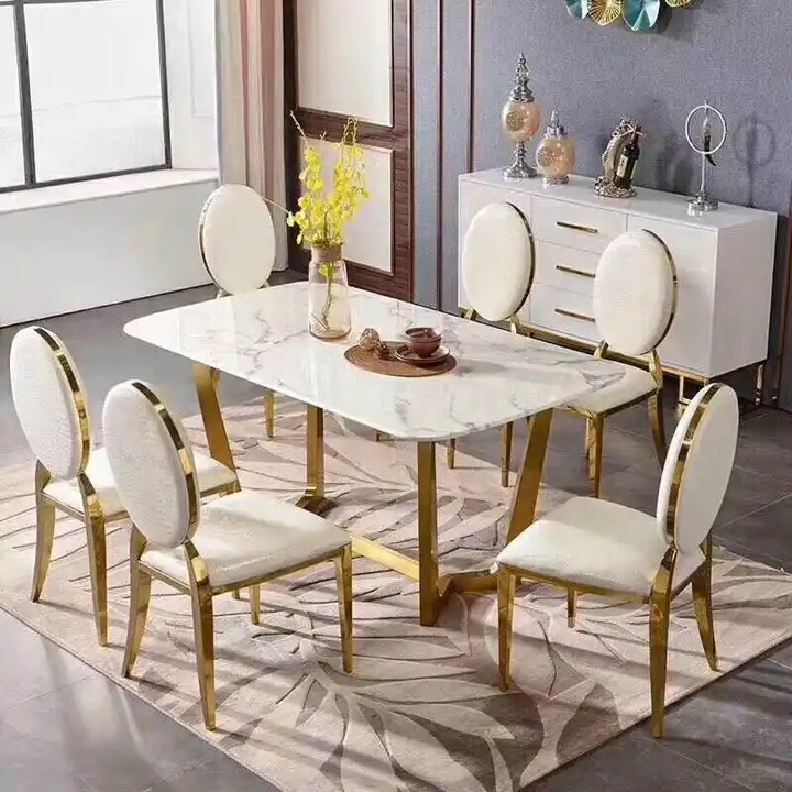 ekskluzywny stół na złotych nogach do jadalni z marmurem