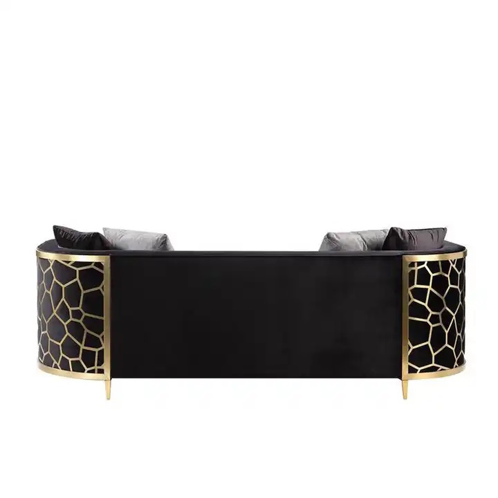 czarna sofa ze złotymi plastrami miodu