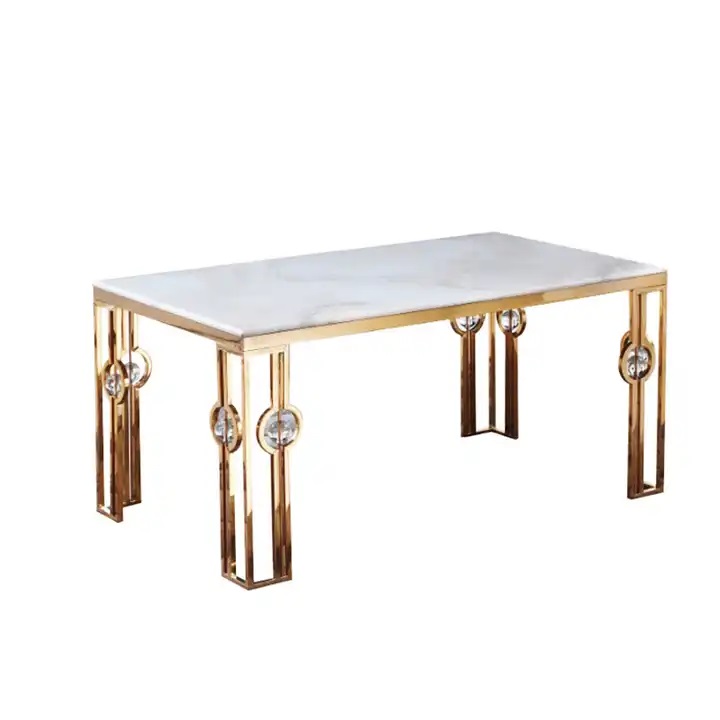 złoty stół z białym marmurem