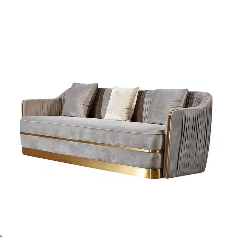 sofa glamour pikowan i złote dodatki